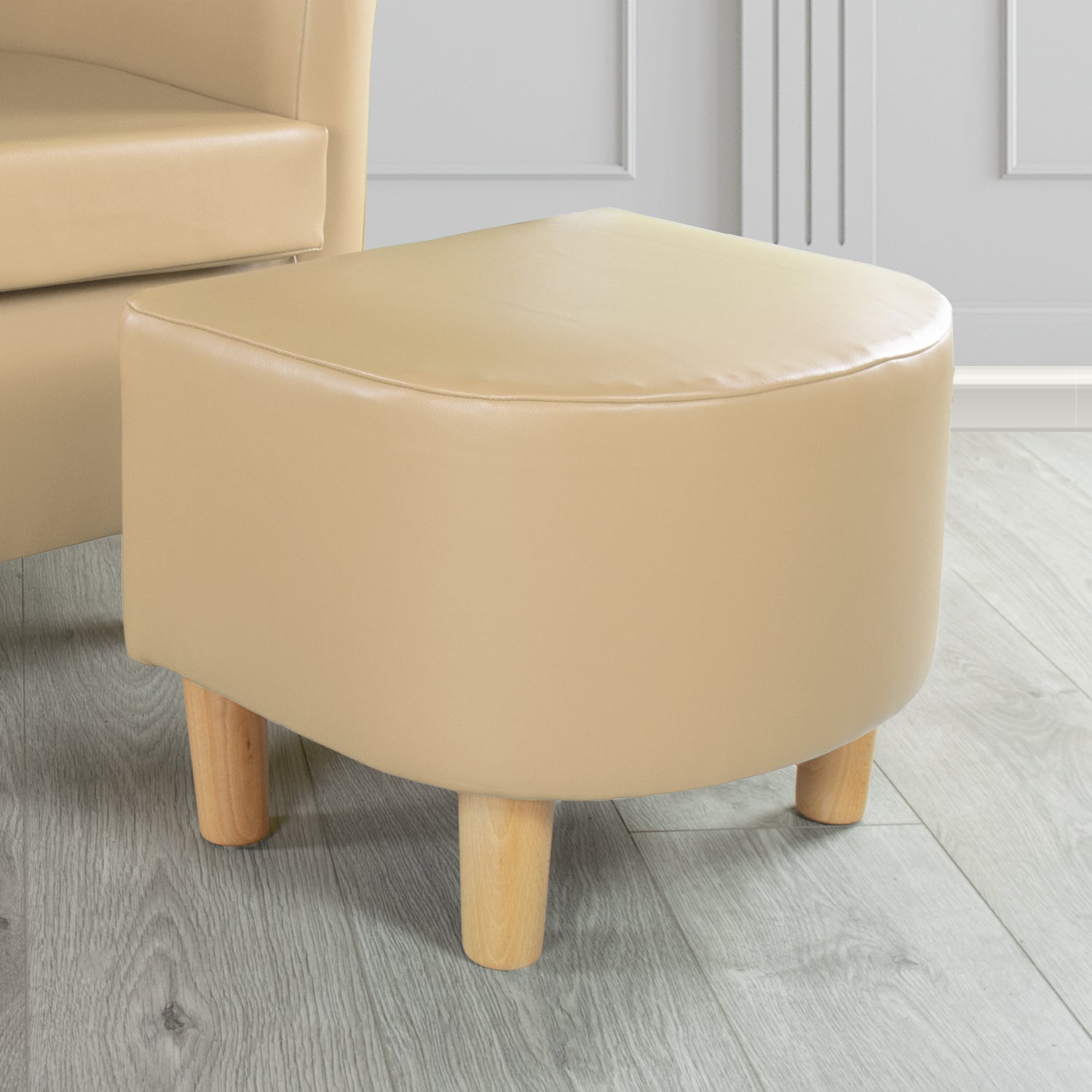 Tuscany Footstool in Chieftain Fabrics Just Colour Faux Leather with Light Wood Legs