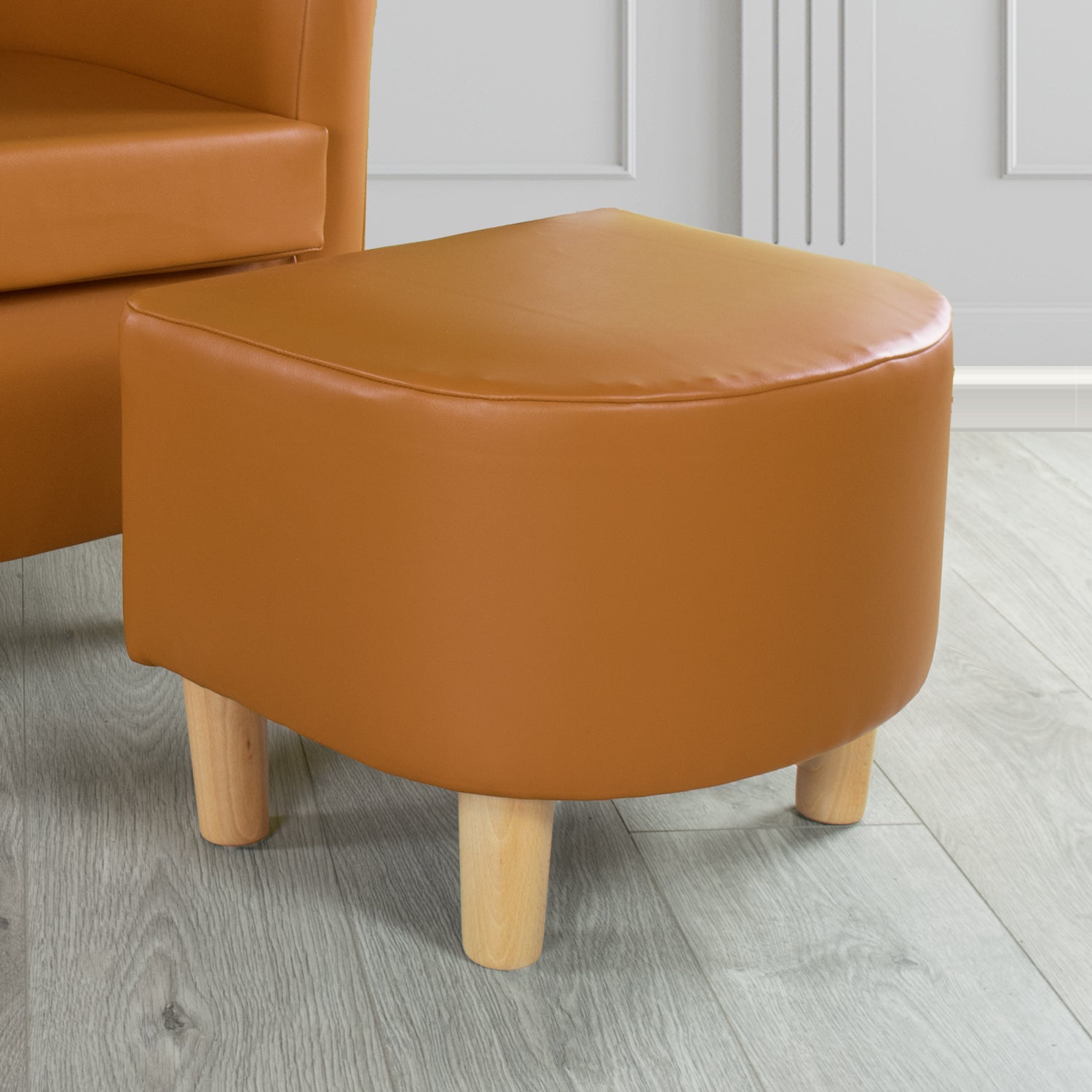 Tuscany Footstool in Chieftain Fabrics Just Colour Faux Leather with Light Wood Legs